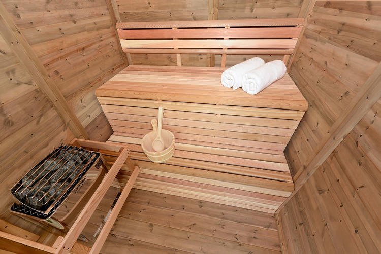 1945_Leisurecraft_Europe_Red_Cedar_Knotty_Outdoor_sauna_interior.330cfa7bae29390c16046519023f6ff4