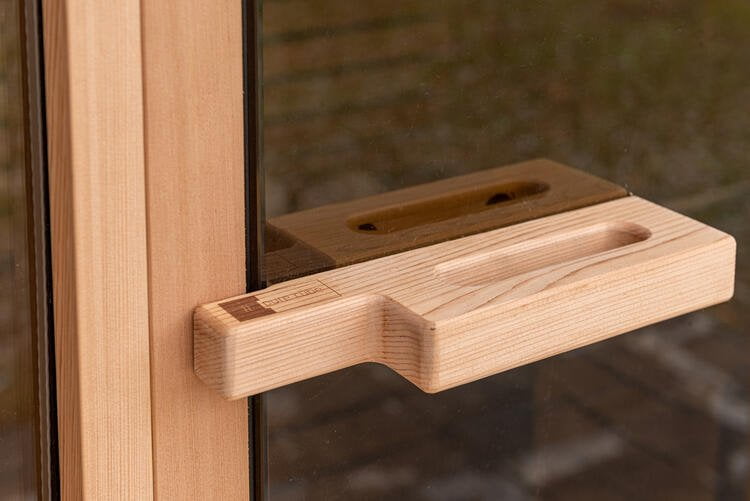 1993_Leisurecraft_Europe_red_cedar_knotty_door_handle.5df6399433aba0fff17bf375b4ace3e0