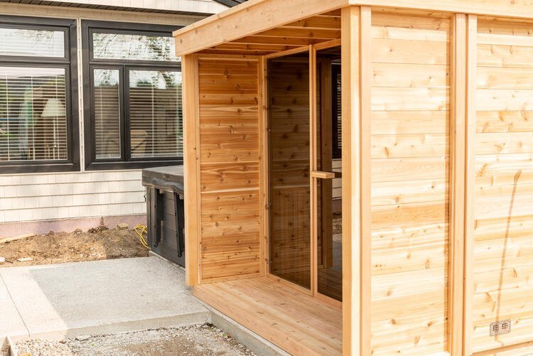2060_outdoor_pure_cube_sauna_with_front_porch_leisurecraft_europe.fc63e12d441fa3e2c97d785558756d9f