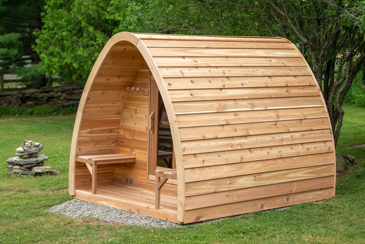 2087_Red_cedar_knotty_pod_sauna_with_front_porch_leisurecraft_europe.4b7453cb937fc84e7de778d52a3152ad
