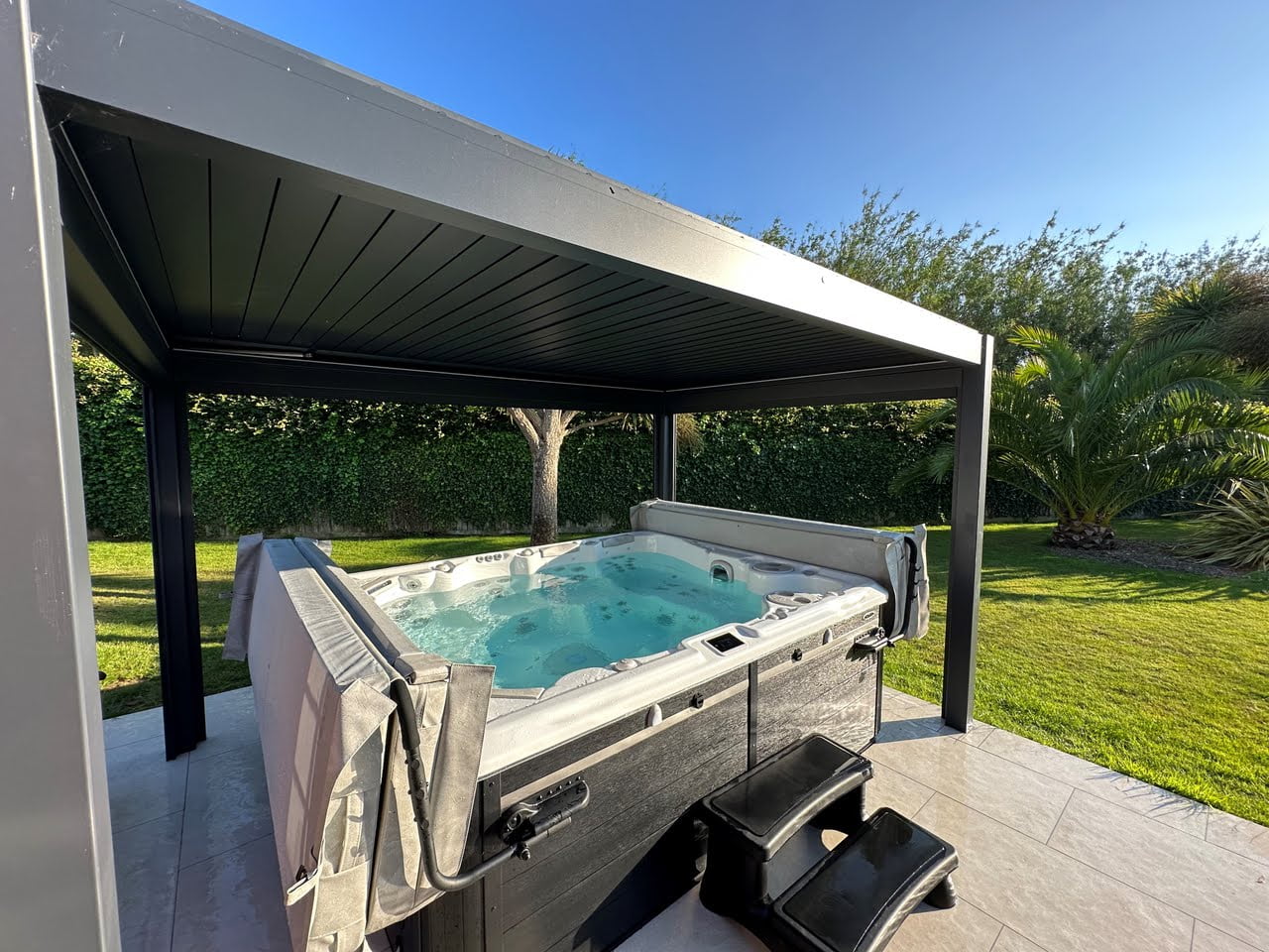 hot tub and pergola